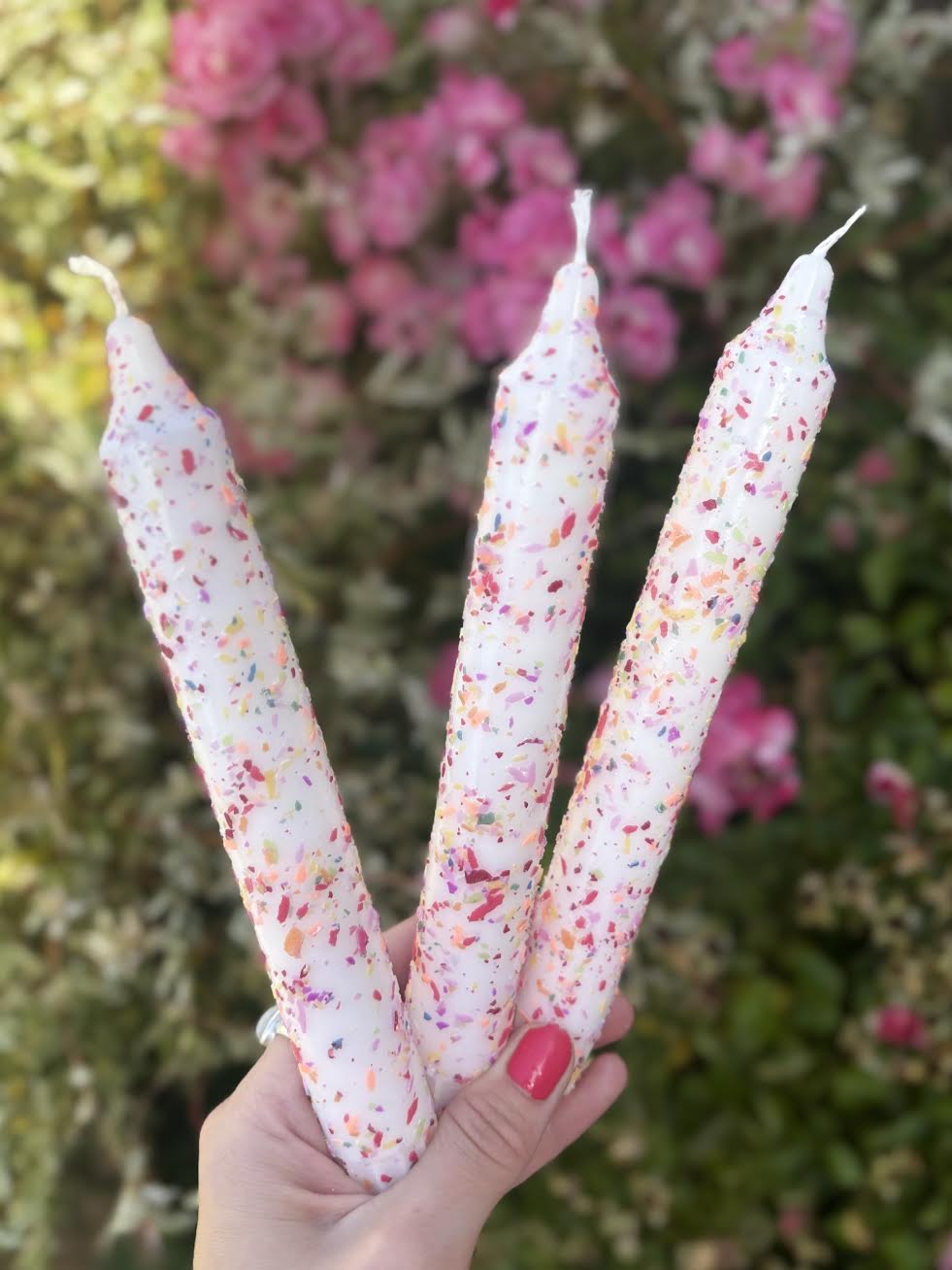 Pair of colourful Confetti hundreds and thousands candles