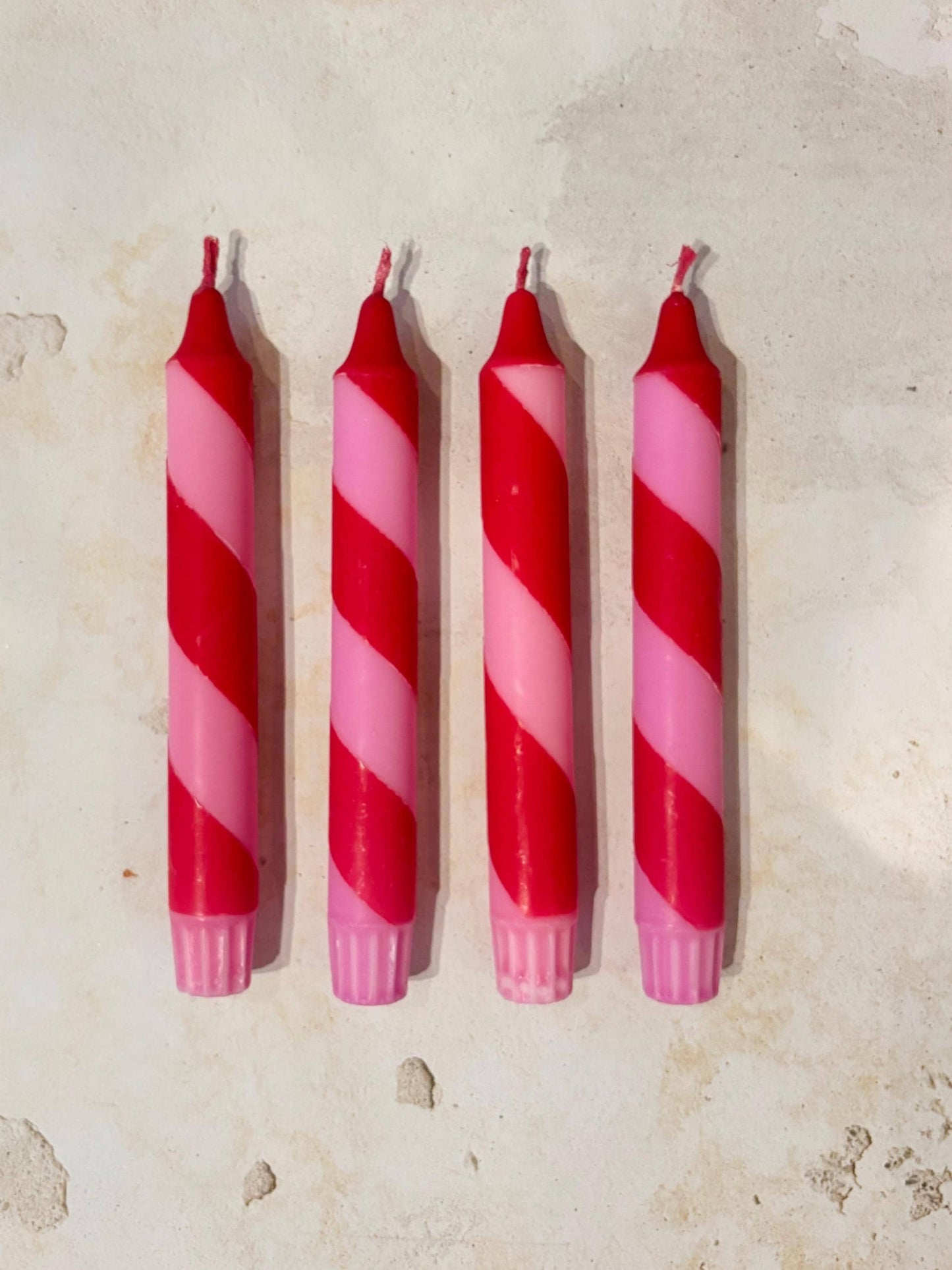 Perfectly imperfect 4 red and pink spiral stripe hand dipped colourful candles